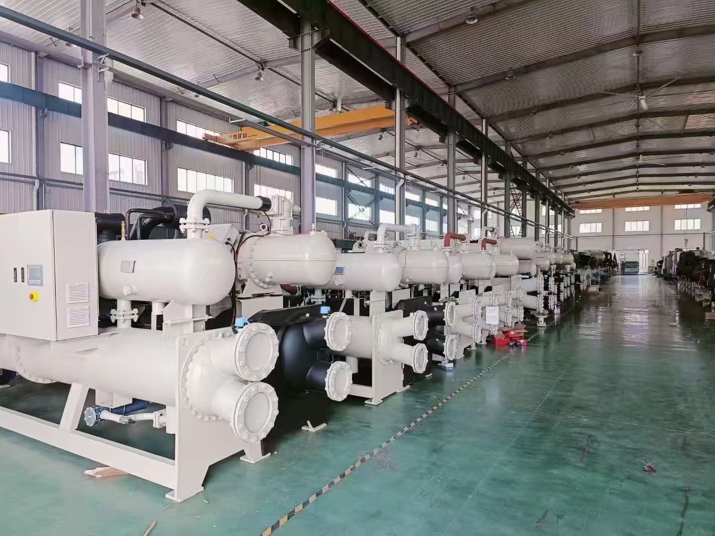 Water cooled screw chiller production line inside the GESON industrial refrigeration factory