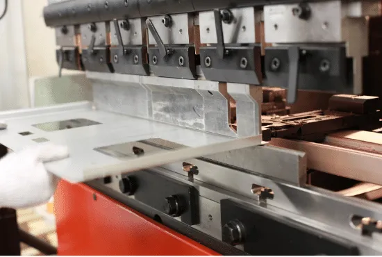 Sheet metal bending machine forming panels for industrial chiller manufacturing